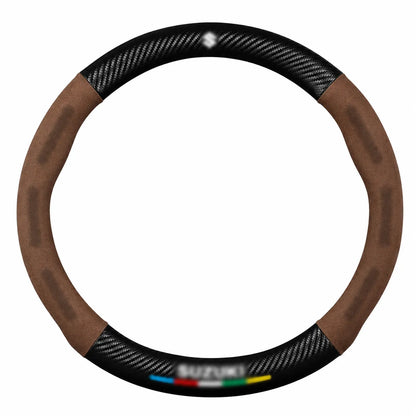 Cubre volante universal • Con logo de marca • Acabados con fibra de carbono y gamuza
